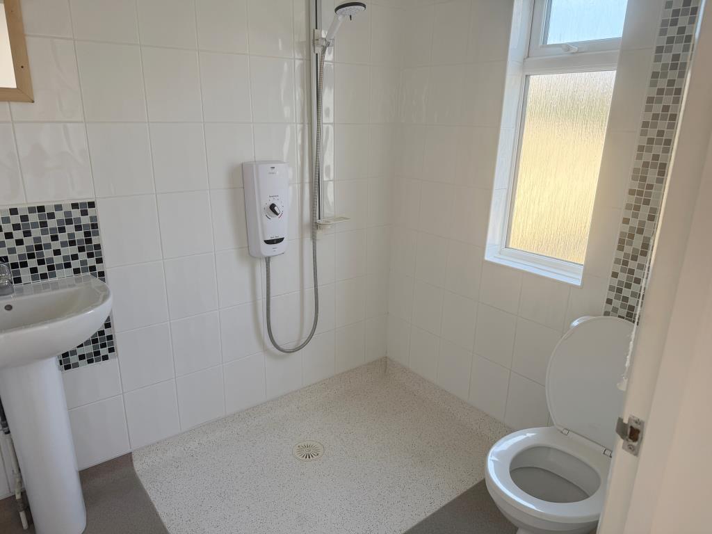 Lot: 91 - DETACHED BUNGALOW FOR INVESTMENT - Walk in shower with white suite and WC